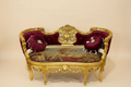 Louis XVI settee — gold gilt and burgundy velvet